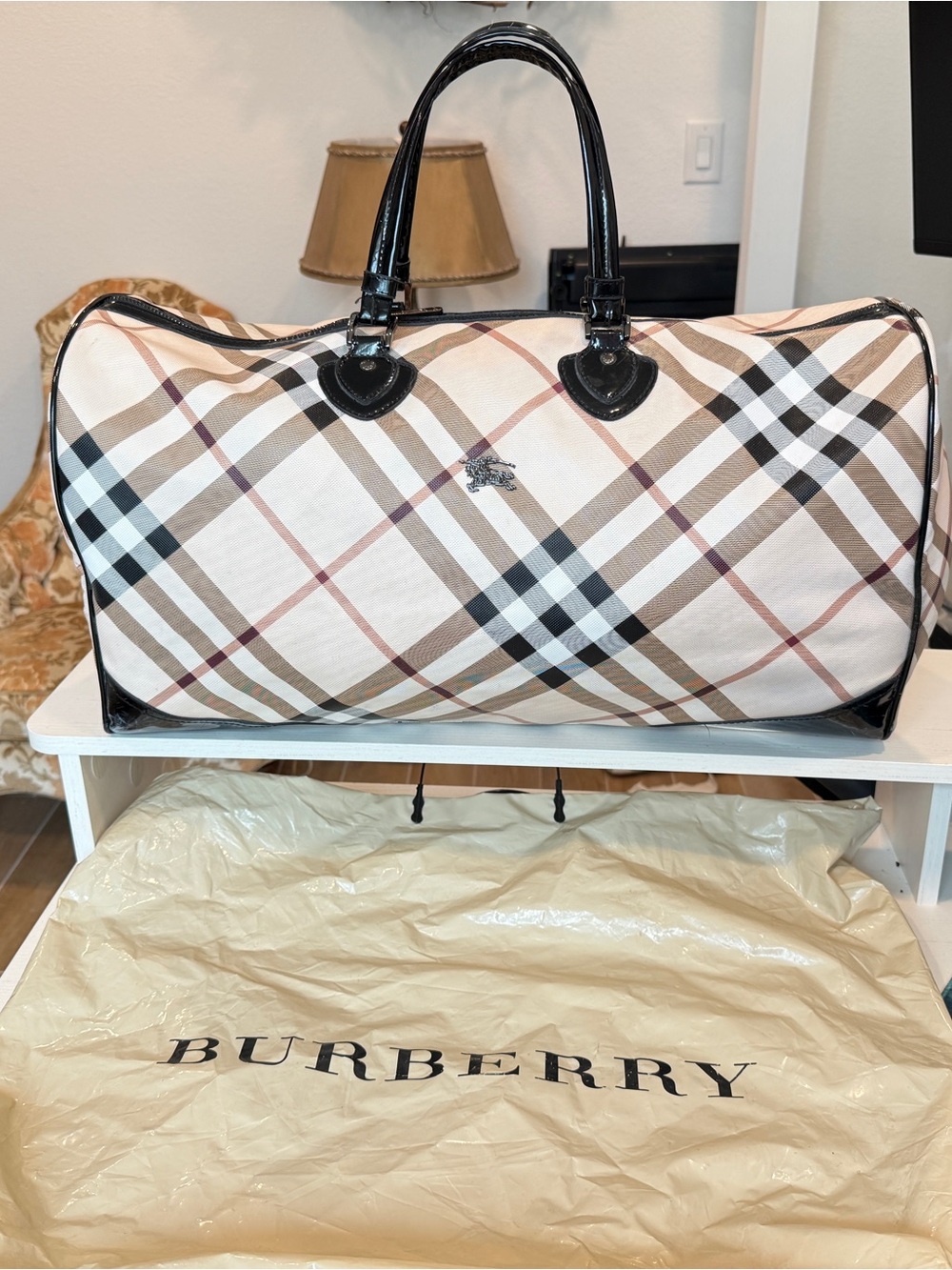 BURBERRY
Nova-Check Coated Canvas Boston Holdall Travel Bag